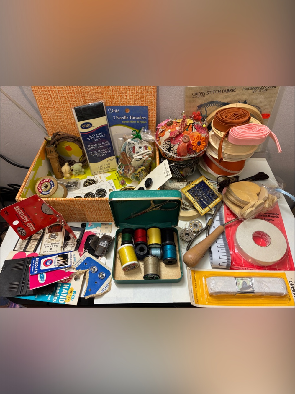 Sewing and craft items along with decorative box